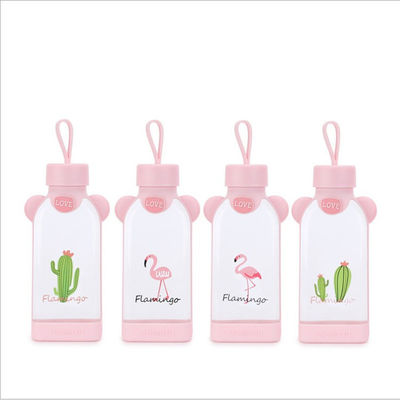 Flamingo Shape Cute Glass Bottle , Pink Glass Bottle With Silicone Sleeve supplier