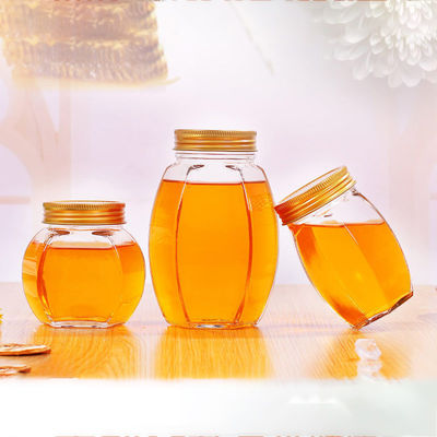 Metal Lid Glass Honey Jar Hexagon Shape Recyclable Food Storage Container supplier